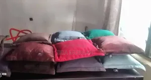 Ètó Throw Pillows