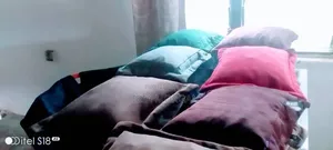 Ètó Throw Pillows
