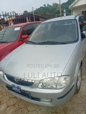 Mazda 323 1999 Silver