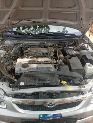 Mazda 323 1999 Silver