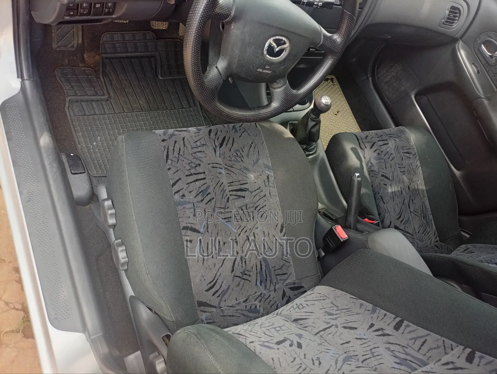 Mazda 323 1999 Silver