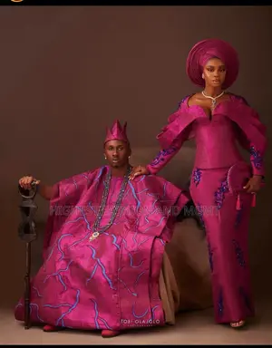 Embellished Gown With Matching Gele Coordinated Magenta Agbada Set