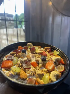 A Parfait Is Made by Yogurt, Crunchy Granola, and Fresh Fruits