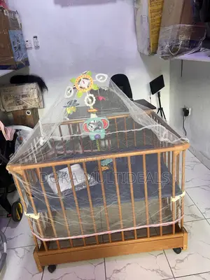 Imported Portable and Foldable Wooden Baby Crib With Musical Rattle