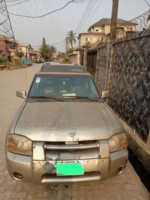 Nissan Frontier 2002 Brown