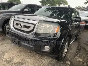 Honda Pilot Touring w/RES/Navi 4WD (3.5L 6cyl 5A) 2010 Black