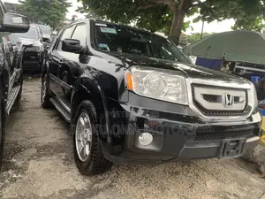 Honda Pilot Touring w/RES/Navi 4WD (3.5L 6cyl 5A) 2011 Black