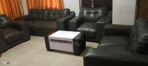 Black Leather 7 Sitter Sofa.