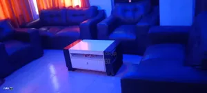 Black Leather 7 Sitter Sofa.