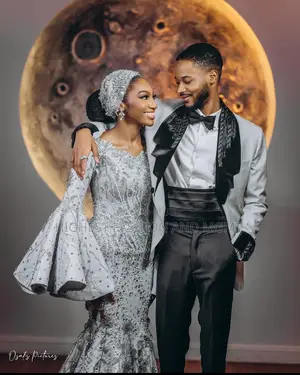 Silver Beaded Mermaid Gown and Grey Tuxedo