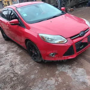 Ford Focus SE 4dr Hatchback (2.0L 4cyl 5M) 2014 Red