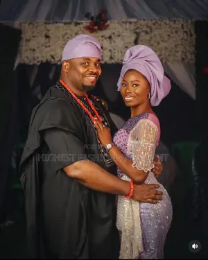 Beaded Lavender Lace Gown and Embroidered Black Agbada