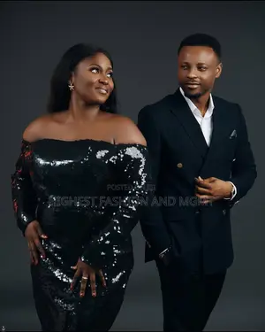 Black Sequin Gown and Navy Blue Double-Breasted Suit