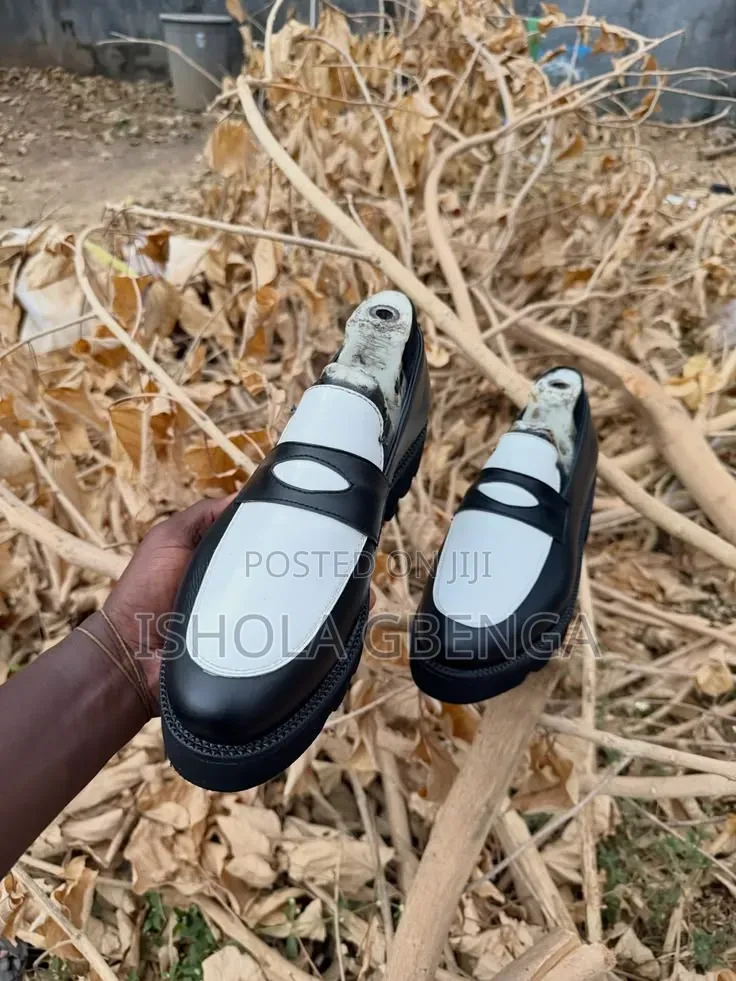 Black Leather Shoe With White Lay Up Design