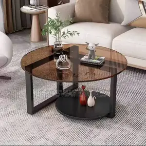 Round Space-Saving Glass Center Table With Unique Mechanism