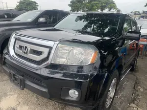Honda Pilot Touring w/RES/Navi 4WD (3.5L 6cyl 5A) 2010 Black