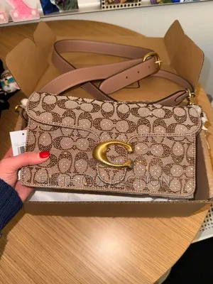 Luxury Coach Tabby Comes With a Long and Short Strap