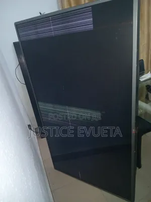 LG 60-Inch Smart TV – Cracked Screen – Powers on – For Parts or Repair