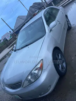 Toyota Camry LE 4dr Sedan (2.4L 4cyl 5M) 2004 White