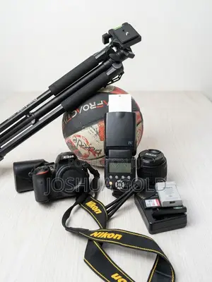 Nikon D3500 DSLR Yungnuo Speedlight and Tripod