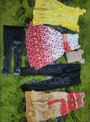 Bundle of Children's Clothes – 7 Pieces in Good Condition
