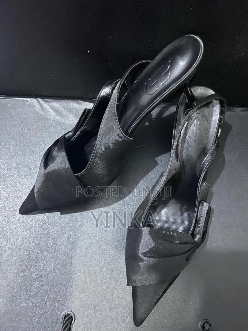 Sandal Heel With a Red Rose