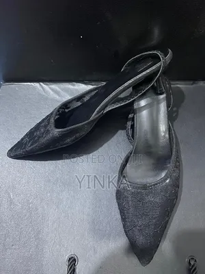Sandal Heel With a Red Rose