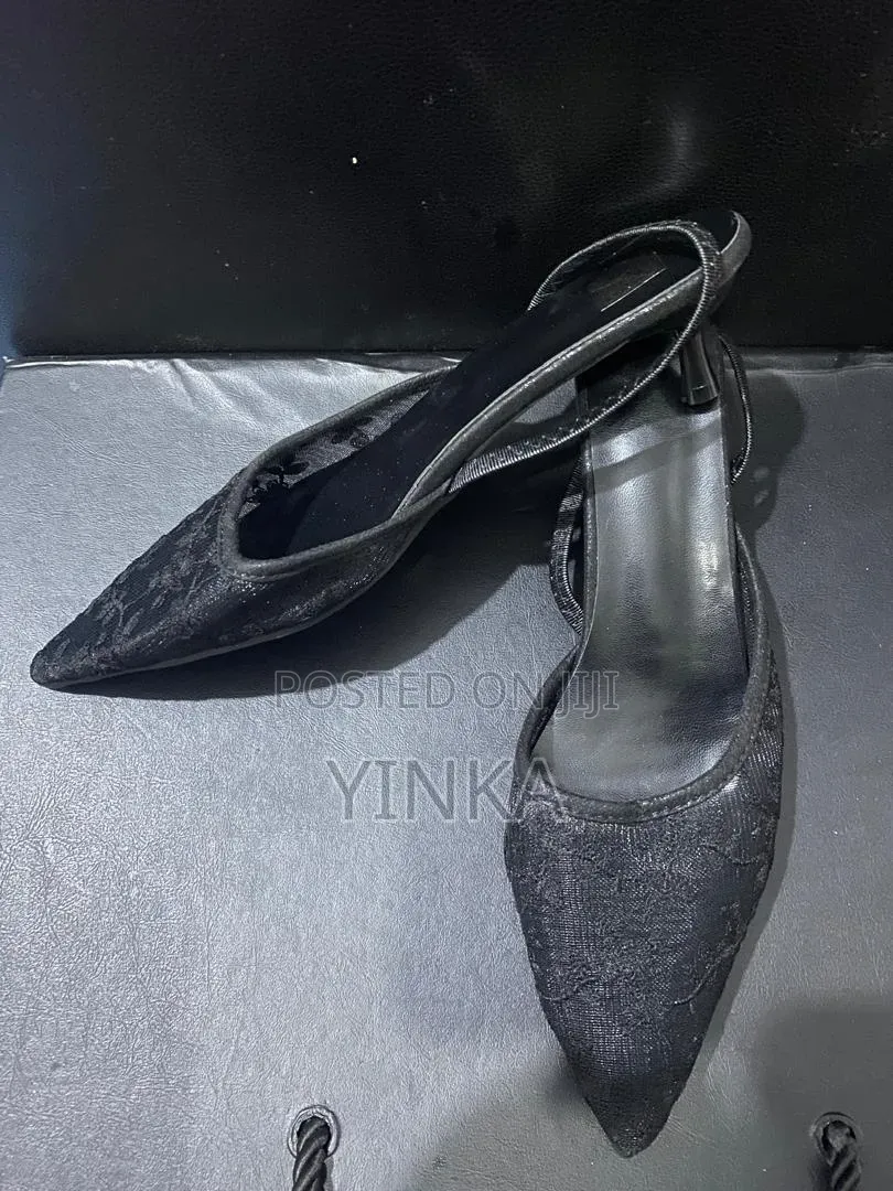 Sandal Heel With a Red Rose