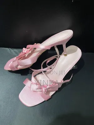 Sandal Heel With a Red Rose