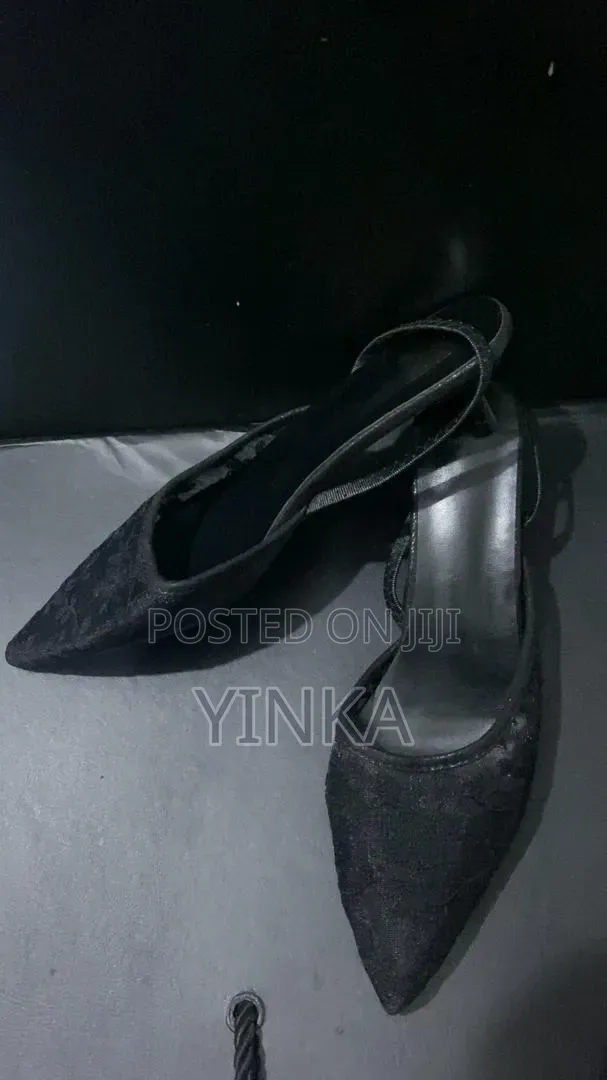 Sandal Heel With a Red Rose