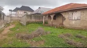 A Standard Plot of Land With a Demolishable Structure on It