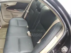 Toyota Corolla Base 4dr Sedan (1.8L 4cyl 5M) 2010 Black