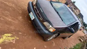Toyota Sienna XLE & 1 hatch 2000 Brown