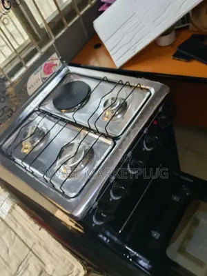 New in Nx-5055 (3+1) Electric Gas Cooker With Hot Tempered Glass Cover