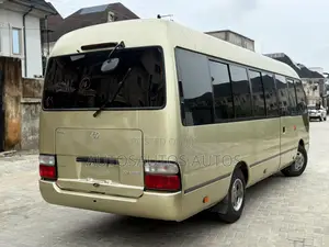 Toyota Coaster 2015 Gold