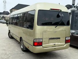 Toyota Coaster 2015 Gold