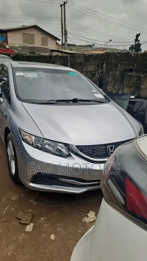 Honda Civic EX-L w/Navigation 4dr Sedan (1.8L 4cyl CVT) 2015 Silver