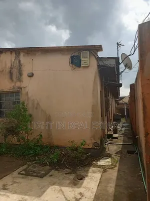Property on Agbe Road With Pure Water Factory