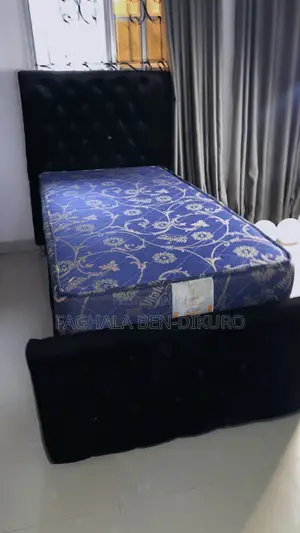 Bed-Frame and Mattress With Side Stool