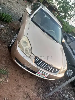 Kia Optima EX Sedan FWD (2.4L 4cyl 5A) 2008 Gold