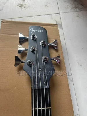 String Electric Bass Guitar With a Glossy Black Finish.