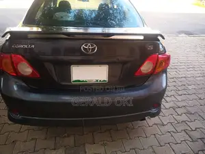 Toyota Corolla Base 4dr Sedan (1.8L 4cyl 5M) 2009 Gray