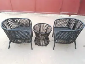 Quality Outdoor Table With Glass Top and Two Seaters