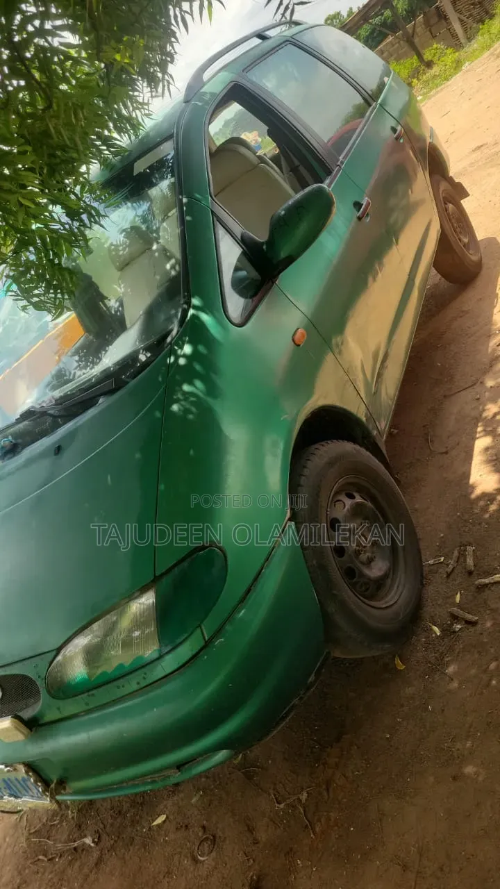 Ford E250 2006 Green
