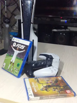 Fairly Used PS5 With Pad, 2 Cd and 4 Game Inside