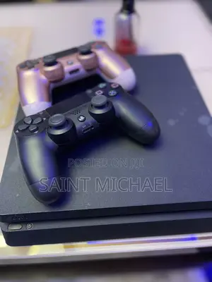 PS4 Slim With 2 Pads and 10 Games. 500gb