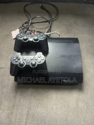 PlayStation3 With Games and Two Controller Power Cord