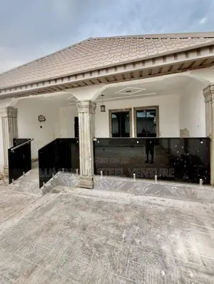 "A Sophisticated Black Glass Balcony Offering a Private, Resort-Like