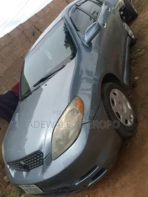 Toyota Matrix XR Hatchback FWD (1.8L 4cyl 4A) 2004 Blue