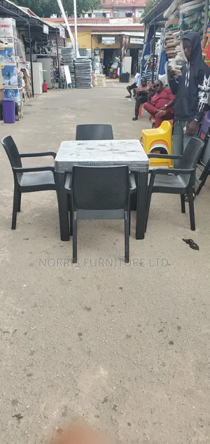 A Sets of Garden Table and Chairs